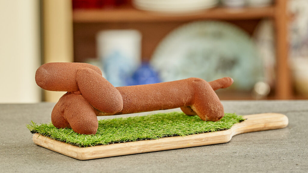 Chocoladedecoraties en een hond van chocolade